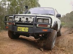 My Old Landcrusier twisting it's suspension!
