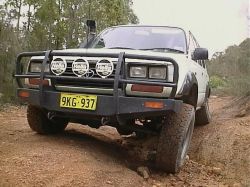 My Old Landcrusier twisting it's suspension!